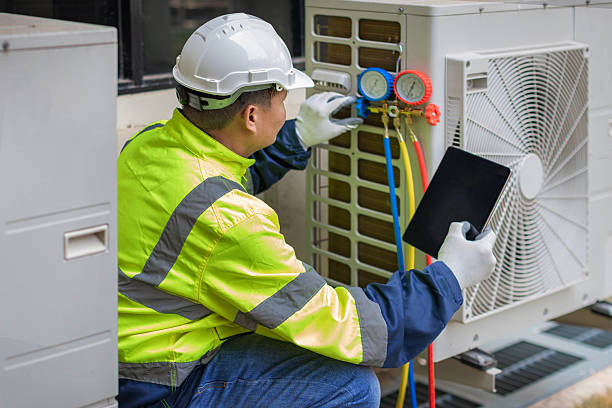 Professional Hvac technician working in Westford, MA
